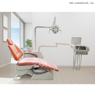 Стоматологическое кресло высокого качества с оранжевым цветом и одним стоматологом -табуретом